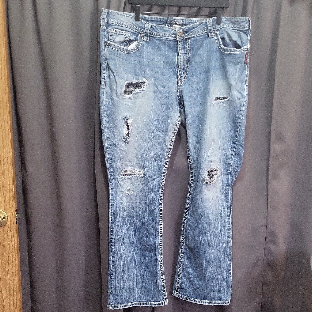 Distressed Blue Jeans